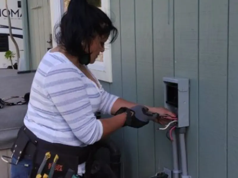 Licensed electrician wiring an exterior subpanel in Port Hadlock-Irondale