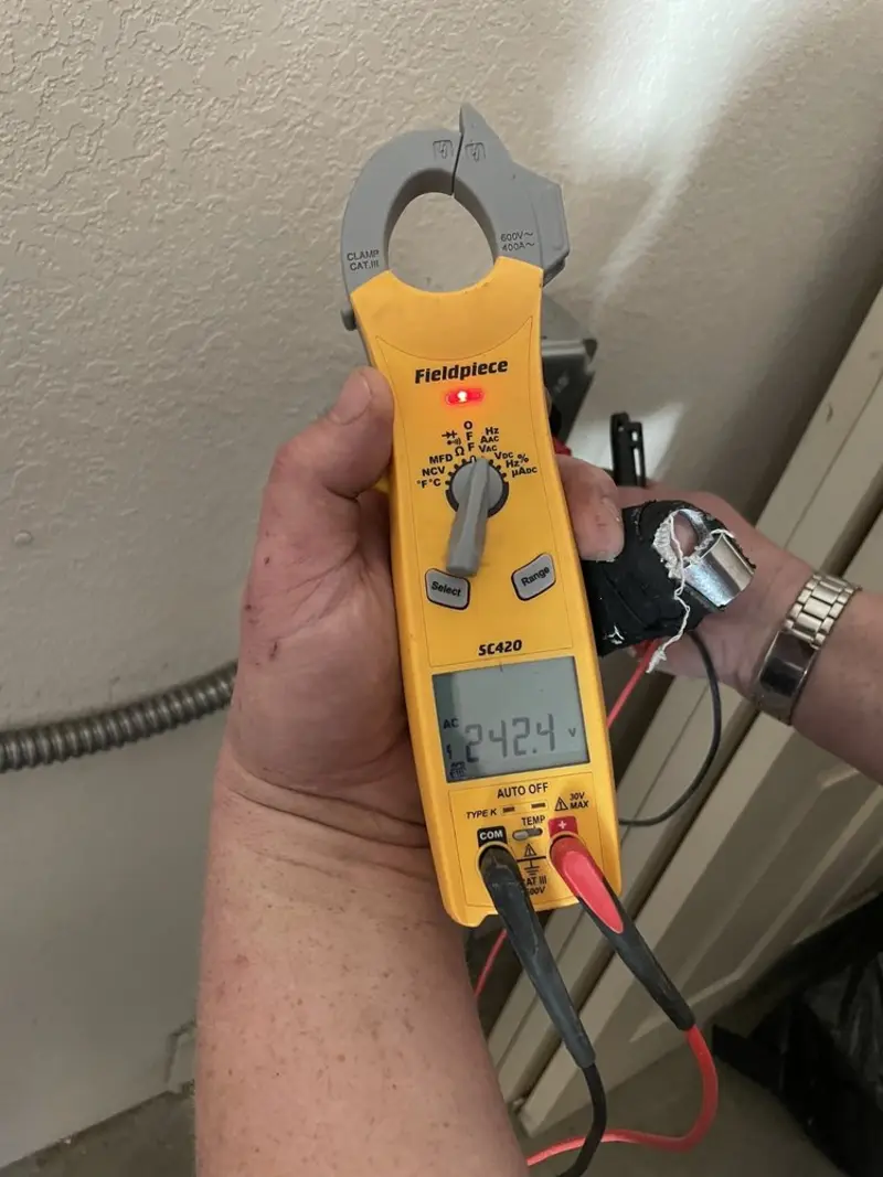 Voltage testing with clamp meter during Circuit Breaker Repair in Port Hadlock-Irondale